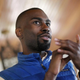 In this March 26, 2016, file photo, Black Lives Matter activist DeRay Mckesson chats with campaign volunteers in Baltimore.